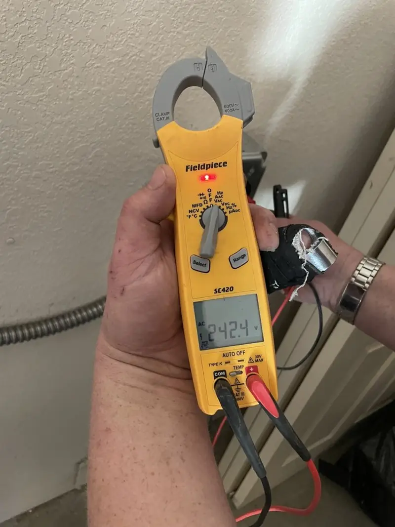 Voltage testing with clamp meter during Hot Tub / Pool Electrical Wiring in Wayland